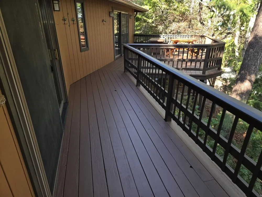 Fifty year old redwood deck sanded and re-stained by Travis Sheets Painting in the Rogue Valley